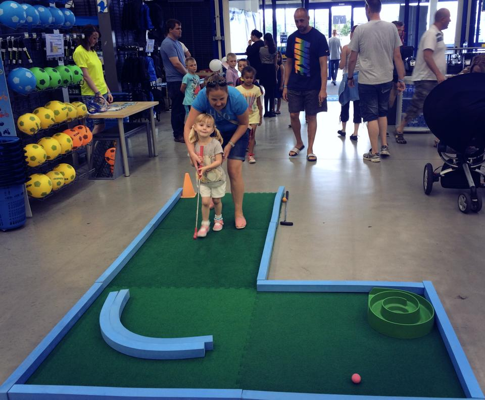 Decathlon Bolton's Family Fun Day with some guests trying out mini golf July 2014