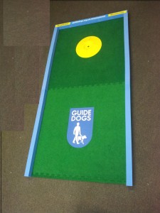 Exhibition Mini Golf hole branded for Guide Dogs